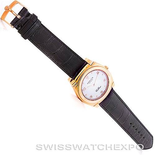 This image shows a Rolex Cellini 5330 Men's Rose Gold White Dial 5330 Men's Rose Gold White Dial watch from a top-down angle, featuring its leather strap and round watch face.