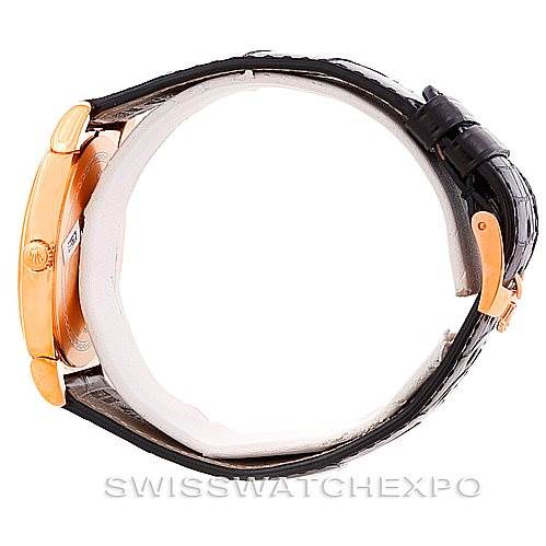 This image shows a Rolex Cellini 5330 Men's Rose Gold White Dial 5330 Men's Rose Gold White Dial watch from a side profile, highlighting the case, crown, and leather strap.