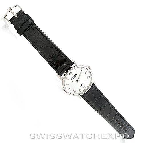 The image shows a Rolex Cellini 5115 Men's White Gold Silver Dial 5115 Men's White Gold Silver Dial watch in a top-down angle, displaying its full face and black leather strap.