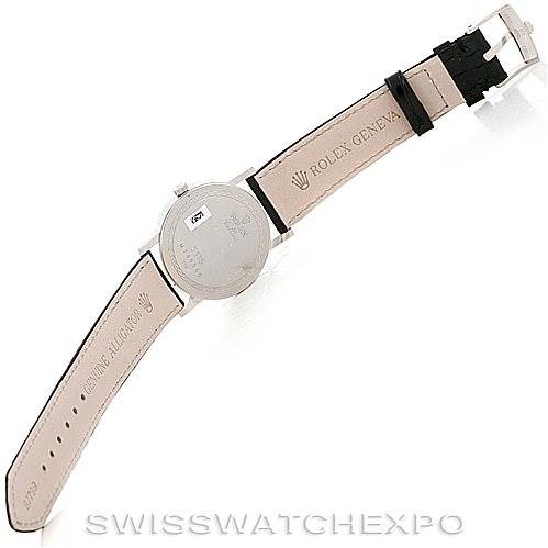 The image shows the back side of a Rolex Cellini 5115 Men's White Gold Black Dial 5115 Men's White Gold Black Dial watch, highlighting the leather strap with brand engraving and the watch's back casing.