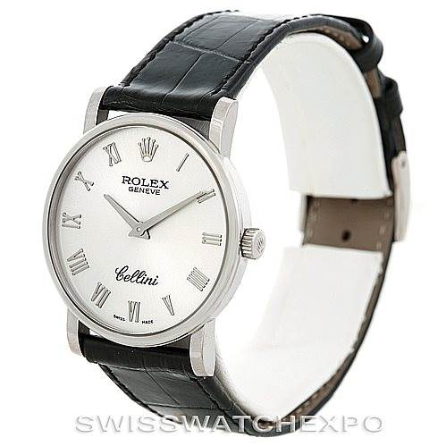 This image shows a Rolex Cellini 5115 Men's White Gold Silver Dial 5115 Men's White Gold Silver Dial watch from an oblique angle, highlighting its face, bezel, crown, and black leather strap.