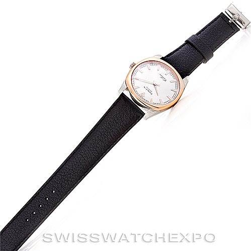 This image shows a top-down view of a Rolex Cellini 4243 Men's White Gold Silver Dial 4243 Men's White Gold Silver Dial watch with a black leather strap and a white dial.