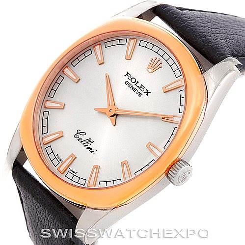 This image shows a Rolex Cellini 4243 Men's White Gold Silver Dial 4243 Men's White Gold Silver Dial watch from an angled perspective, highlighting its dial, bezel, and part of the leather strap.