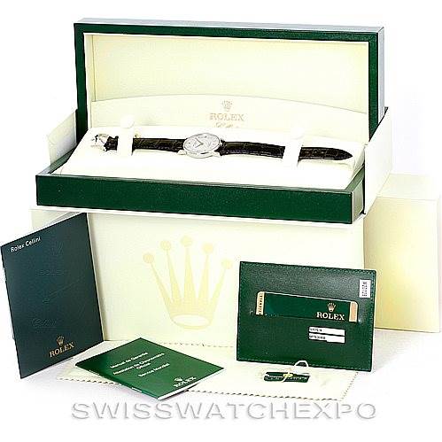 The image shows a Rolex Cellini 5115 Men's White Gold Silver Dial 5115 Men's White Gold Silver Dial model watch in its open case, including manuals, a tag, and a warranty card.