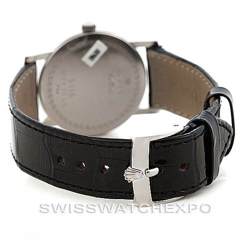 This image shows the back of a Rolex Cellini 5115 Men's White Gold Silver Dial 5115 Men's White Gold Silver Dial watch with a focus on the black leather strap and its clasp.