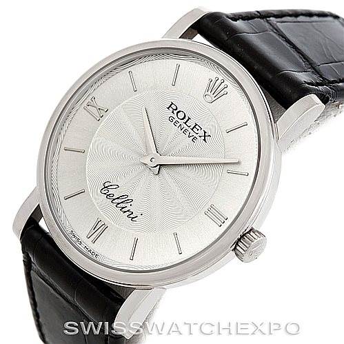 This image shows a close-up of the Rolex Cellini 5115 Men's White Gold Silver Dial 5115 Men's White Gold Silver Dial watch face and part of the leather strap from a slightly angled aerial view.