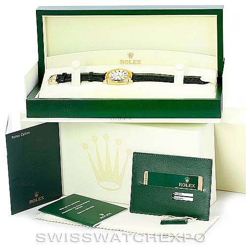 The image shows a Rolex Cellini 5330 Men's Yellow Gold White Dial 5330 Men's Yellow Gold White Dial watch in an open box, accompanied by its authentication cards, booklet, and packaging.