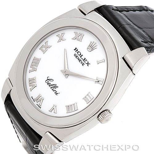 The image shows a Rolex Cellini 5330 Men's White Gold White Dial 5330 Men's White Gold White Dial watch from a three-quarter angle, highlighting its white face, Roman numeral markers, and black leather strap.