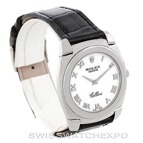 This image shows a Rolex Cellini 5330 Men's White Gold White Dial 5330 Men's White Gold White Dial watch at a three-quarter angle, highlighting its black leather strap, silver casing, and white dial with Roman numerals.