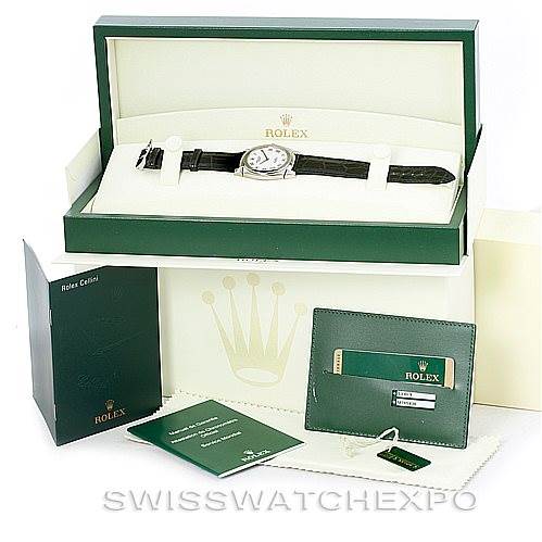 The image shows a Rolex Cellini 5330 Men's White Gold White Dial 5330 Men's White Gold White Dial watch displayed in its open box, along with manuals, a cardholder, and branded packaging.