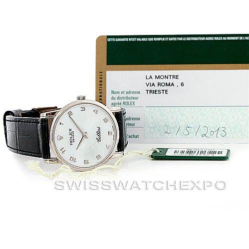 The image shows a Rolex Cellini 5116 Men's White Gold Mother of Pearl Dial 5116 Men's White Gold Mother of Pearl Dial watch from a front angle, including its leather band, alongside an authenticity card and tag.