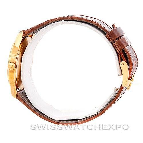 This image shows a side view of the Rolex Cellini 5116 Men's Yellow Gold Champagne Dial 5116 Men's Yellow Gold Champagne Dial watch, highlighting the case, crown, and brown leather strap with a buckle.