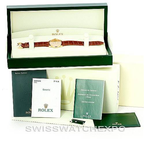 The image shows a Rolex Cellini 5116 Men's Yellow Gold Champagne Dial 5116 Men's Yellow Gold Champagne Dial watch in its box, along with warranty papers and booklets.