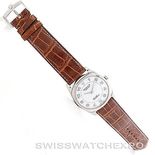 The image shows a top view of a Rolex Cellini 4233 Men's White Gold White Dial 4233 Men's White Gold White Dial model watch, highlighting its brown leather strap and white dial.