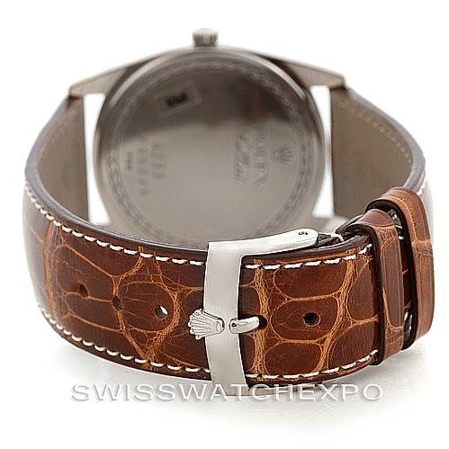 The image shows the back case and clasp of a Rolex Cellini 4233 Men's White Gold White Dial 4233 Men's White Gold White Dial watch with a brown leather strap.