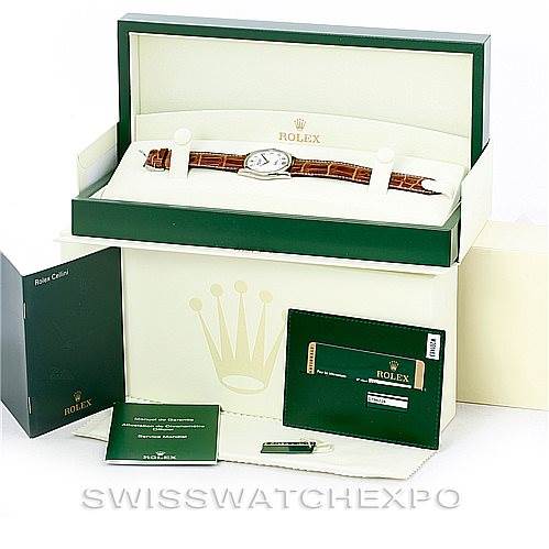 The image shows a Rolex Cellini 4233 Men's White Gold White Dial 4233 Men's White Gold White Dial watch with its box, manuals, and warranty card from a front angle.