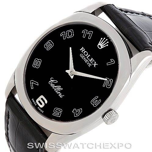 This image shows a Rolex Cellini 4233 Men's White Gold Black Dial 4233 Men's White Gold Black Dial watch angled slightly from above, highlighting the face, crown, and part of the leather strap.