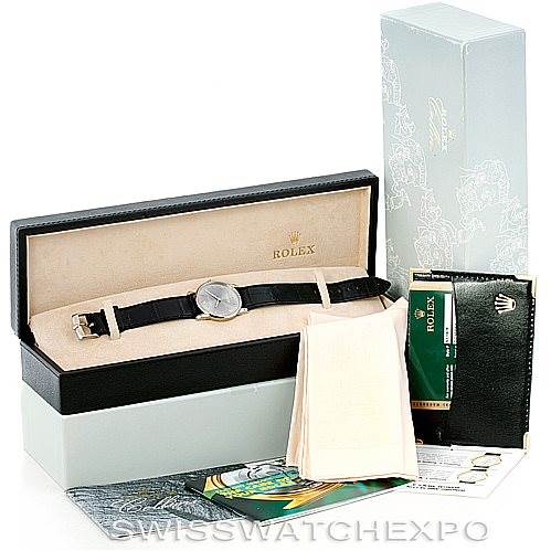 The image shows a Rolex Cellini 5116 Men's White Gold Grey Dial 5116 Men's White Gold Grey Dial watch with its box, warranty card holder, cleaning cloth, and packaging viewed from a frontal angle.