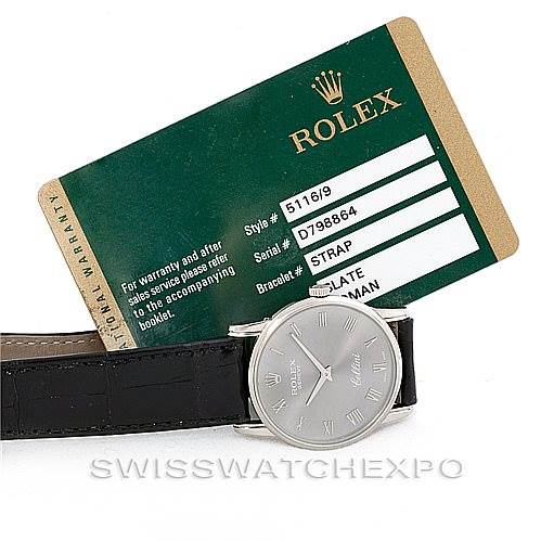 The image shows a Rolex Cellini 5116 Men's White Gold Grey Dial 5116 Men's White Gold Grey Dial watch face and strap along with its warranty card, viewed from the front.