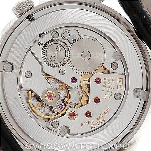 The image shows the back view of the Rolex Cellini 5116 Men's White Gold Grey Dial 5116 Men's White Gold Grey Dial watch, revealing its exposed mechanical movement and intricate gears.