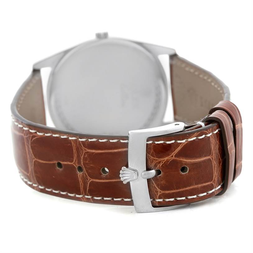 The image shows the back view of a Rolex Cellini 4233 Men's White Gold Black Dial 4233 Men's White Gold Black Dial watch highlighting the brown leather strap and the signed buckle.