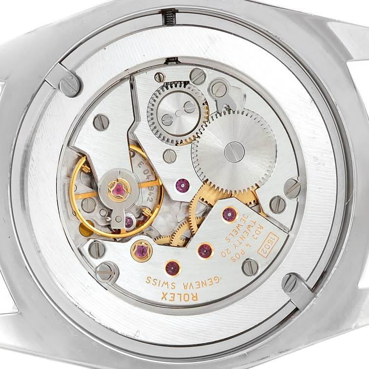 This image shows the intricate internal mechanism of the Rolex Cellini 4233 Men's White Gold Black Dial 4233 Men's White Gold Black Dial watch from a rear angle.