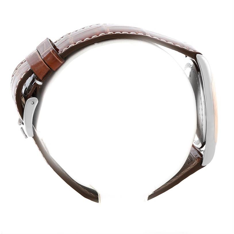 This image shows a side profile of a Rolex Cellini 4233 Men's White Gold Black Dial 4233 Men's White Gold Black Dial watch with a brown leather strap and silver case.