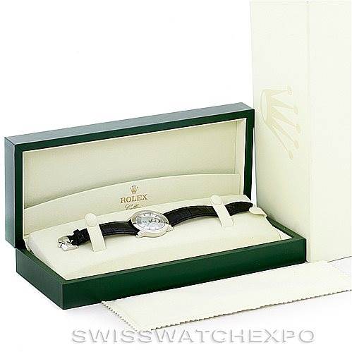 The image shows a Rolex Cellini 5241 Men
s Platinum Blue Dial 5241 Men
s Platinum Blue Dial watch in its open display box with a cleaning cloth beside it.
