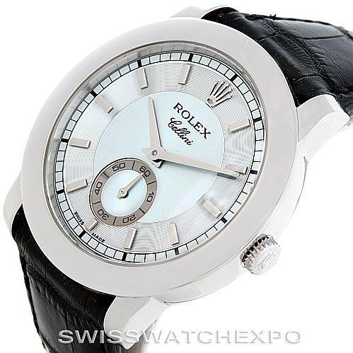 This Rolex Cellini 5241 Men
s Platinum Blue Dial 5241 Men
s Platinum Blue Dial watch is shown at an angle showcasing its face, bezel, crown, and leather strap.