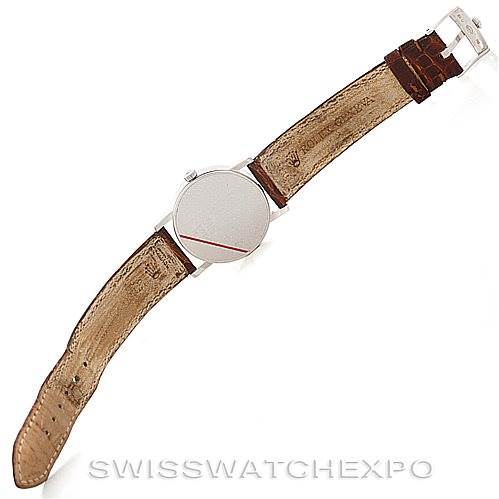 The image shows a top view of a Rolex Cellini 5115 Men's White Gold Brown Dial 5115 Men's White Gold Brown Dial watch with an open brown leather strap and a visible blank face.