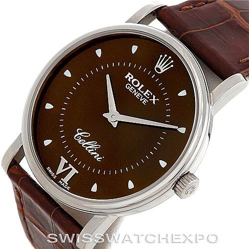 This image shows a close-up, angled view of the Rolex Cellini 5115 Men's White Gold Brown Dial 5115 Men's White Gold Brown Dial watch, showcasing its brown dial, crown, and leather strap.