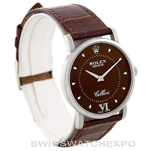 The image shows a Rolex Cellini 5115 Men's White Gold Brown Dial 5115 Men's White Gold Brown Dial watch at a slight angle, clearly displaying its face, crown, and brown leather strap.