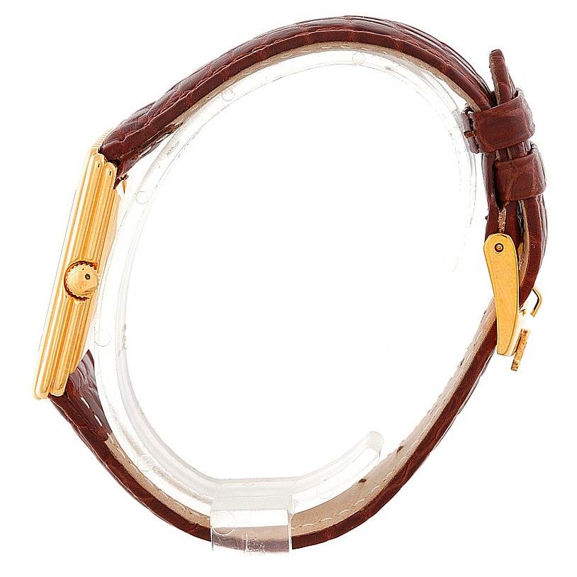 The image shows a side view of a Rolex Cellini 4016 Men's Yellow Gold Brown Dial 4016 Men's Yellow Gold Brown Dial watch displaying its gold case, crown, and brown leather strap with buckle.