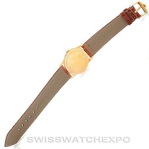 This image shows the back view of a Rolex Cellini 5116 Men's Yellow Gold Grey Dial 5116 Men's Yellow Gold Grey Dial model watch, including the case back and leather strap.