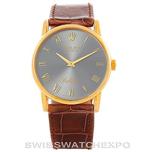The image shows a front view of a Rolex Cellini 5116 Men's Yellow Gold Grey Dial 5116 Men's Yellow Gold Grey Dial watch with a gold case, grey dial, brown leather strap, and Roman numerals.