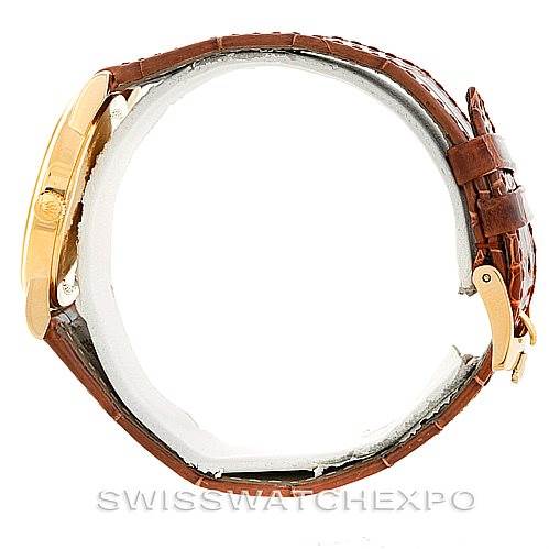 This image shows a side view of a Rolex Cellini 5116 Men's Yellow Gold Grey Dial 5116 Men's Yellow Gold Grey Dial watch with a brown leather strap and a gold case.