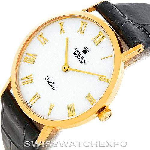 The image shows the face of the Rolex Cellini 4112 Men's Yellow Gold White Dial 4112 Men's Yellow Gold White Dial watch at a tilted angle, featuring gold Roman numerals, a white dial, and a black leather strap.