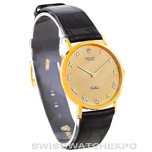 The image shows a side angle of a Rolex Cellini 4112 Men's Yellow Gold Champagne Dial 4112 Men's Yellow Gold Champagne Dial watch, focusing on its gold case, black leather strap, and analog dial.