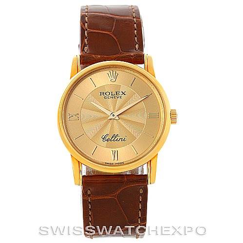 The image shows a frontal view of a Rolex Cellini 5116 Men's Yellow Gold Champagne Dial 5116 Men's Yellow Gold Champagne Dial watch with a gold case and brown leather strap.