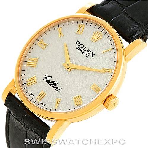 The image shows a Rolex Cellini 5115 Men's Yellow Gold  5115 Men's Yellow Gold  model watch at an angle displaying its face, gold case, crown, and a portion of its black leather strap.