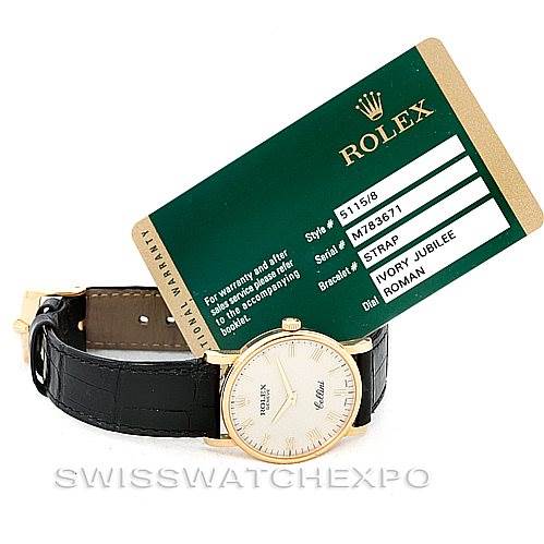 The image shows a Rolex Cellini 5115 Men's Yellow Gold  5115 Men's Yellow Gold  model watch from a front angle, displaying the face and strap, alongside its warranty card.