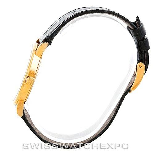 The image shows the side profile of a Rolex Cellini 5115 Men's Yellow Gold  5115 Men's Yellow Gold  watch, highlighting the gold case, crown, and black leather strap.