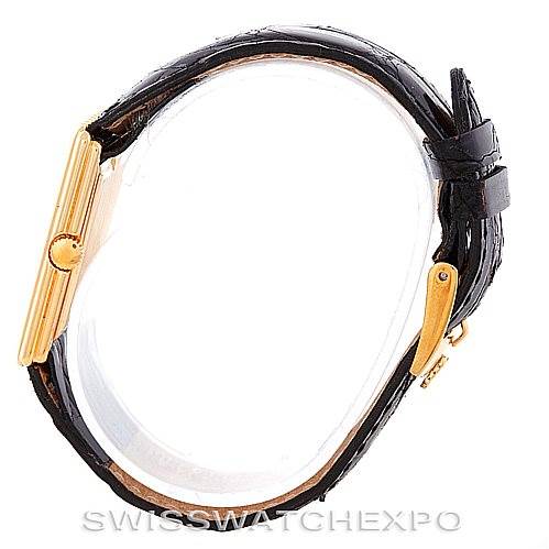 The image shows the side view of a Rolex Cellini 4016 Men's Yellow Gold Champagne Dial 4016 Men's Yellow Gold Champagne Dial watch, highlighting the black leather strap and gold buckle.