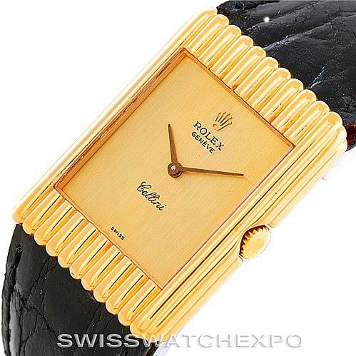 The Rolex Cellini 4016 Men's Yellow Gold Champagne Dial 4016 Men's Yellow Gold Champagne Dial watch is shown from an above angle, displaying its rectangular gold case, dial, crown, and part of the black leather strap.