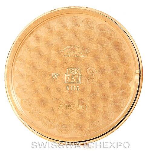 This image shows the inside of a Rolex Cellini 5115 Men
s Yellow Gold Beige Dial 5115 Men
s Yellow Gold Beige Dial watch case back, featuring gold material and engraved markings.