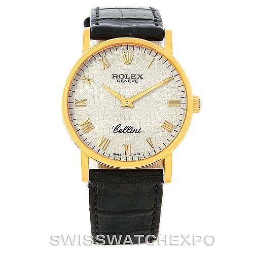 The image shows a front view of a Rolex Cellini 5115 Men
s Yellow Gold Beige Dial 5115 Men
s Yellow Gold Beige Dial watch with a gold case, Roman numeral markers, and a black leather strap.
