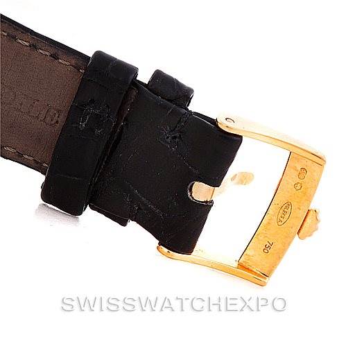 The image shows the buckle and strap end of a Rolex Cellini 5115 Men
s Yellow Gold Beige Dial 5115 Men
s Yellow Gold Beige Dial watch from a close-up angle.