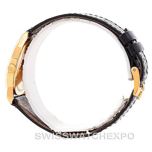 The image shows a Rolex Cellini 5116 Men's Yellow Gold Mother of Pearl Dial 5116 Men's Yellow Gold Mother of Pearl Dial watch from a side profile, focusing on the case, crown, and leather strap with a buckle.