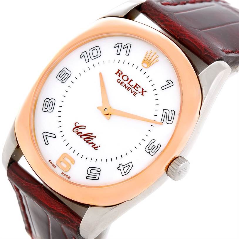 The Rolex Cellini 4233 Men's White Gold White Dial 4233 Men's White Gold White Dial watch is shown at a tilted angle, displaying its dial, bezel, crown, and part of the leather strap.