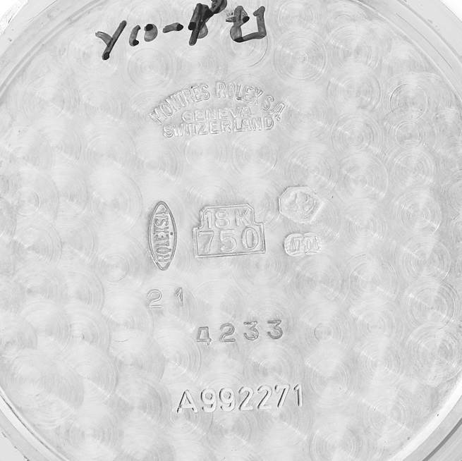 This image shows the inner case back of a Rolex Cellini 4233 Men's White Gold White Dial 4233 Men's White Gold White Dial watch, featuring engraved model and material details.